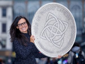 Judith holding coin2